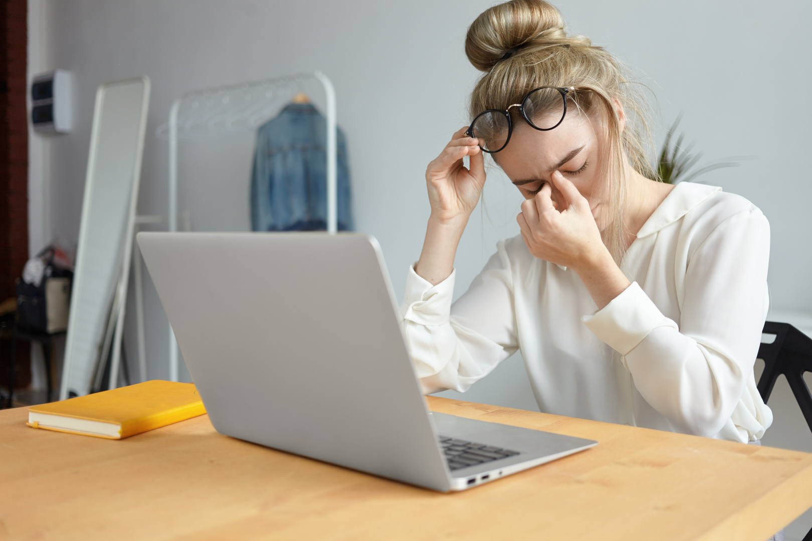modern-technology-job-people-concept-portrait-tired-young-female-employee-with-hair-bun-taking-off-eyeglasses-massaging-her-nose-bridge-feeling-stressed-because-lot-work.jpg